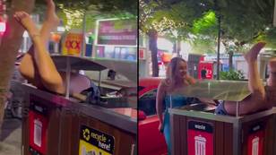 Woman gets stuck in rubbish bin after wild night out