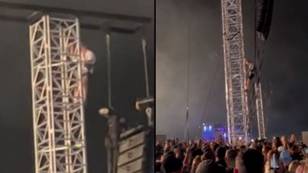 Festivalgoers chant ‘w***er’ and throw beers at guy who delayed Calvin Harris by climbing up scaffolding