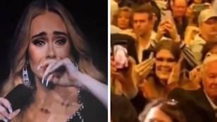 Adele left sobbing after man in audience appears to hold up photo of his late wife