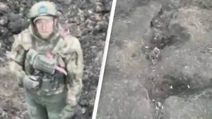 Russian soldier surrenders to Ukrainian drone before being led across No Man's Land in incredible footage