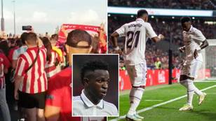 Atletico Madrid fans chant 'Vinicius is a monkey' while one holds up a vile racist doll ahead of Real Madrid clash