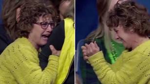 Mother of college wrester crushes her own glasses after he suffers upset loss