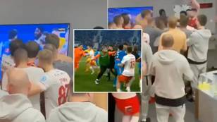 Spartak Moscow players celebrate whilst watching replay of Zenit fight