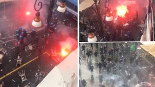 Streets of Naples on fire as football fans clash with police before Champions League match