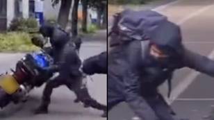 Masked hammer-wielding thugs too weak to steal motorbike