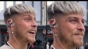 Busker praised for his way of dealing with woman who attempted to grab mic