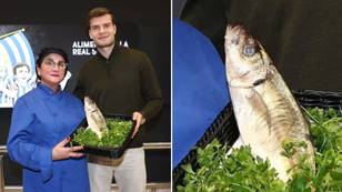 Alexander Sorloth presented with a fish after being named Real Sociedad's Player of the Month