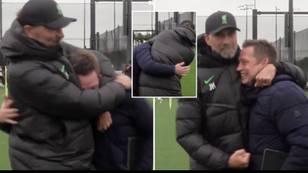 Jurgen Klopp gets Sky reporter in a headlock and 'punches him' for giving Liverpool another early kick-off