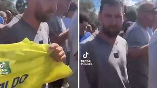 Lionel Messi's stunned reaction after fan tries to hand him Cristiano Ronaldo shirt
