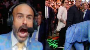 Jon Anik was so stunned by Israel Adesanya's KO that he actually fell out of his chair