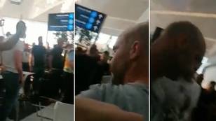 Referee Anthony Taylor mobbed by Roma fans at the airport