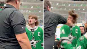 Hockey fan with a mullet gets punched in the face after calling man the N-word