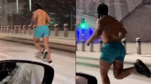Half-naked man spotted sprinting in the snow convinces people ‘London is a simulation’
