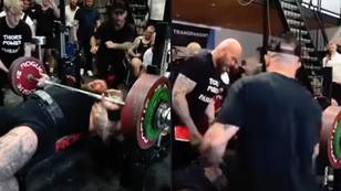 The Mountain screams in agony as you can hear his pec tear during bench press
