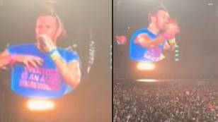 Chris Martin stops Coldplay gig midway through song to ask crowd not to use cameras or phones