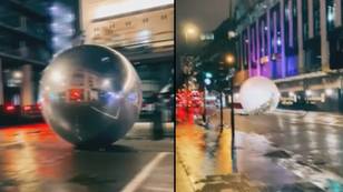 Giant Christmas baubles cause chaos on busy London street