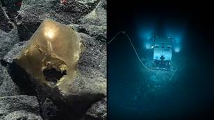 Scientists are analysing a mysterious golden orb that was found on the bottom of the ocean
