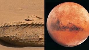 Scientists believe an alien spaceship could have crashed into Mars