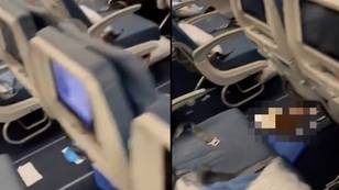 Footage shows clean-up operation on flight after passenger's horrific diarrhoea caused plane to turn back