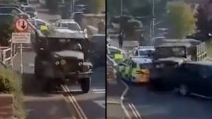 Military truck filmed ramming through police blockade in real-life GTA scenes