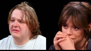 Lewis Capaldi says Jenna Ortega can 'f***ing handle a wing' as he starts crying in pain on Hot Ones