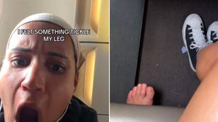 Passenger left horrified after she felt a cold tickle on her leg only to see it was a man's bare foot