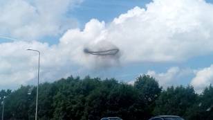 Weird, Black, Ring-Shaped UFO Spotted On A Motorway In England