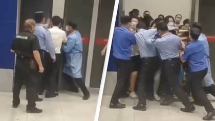 Shanghai IKEA shoppers try to escape after a spontaneous lockdown was called in the shop