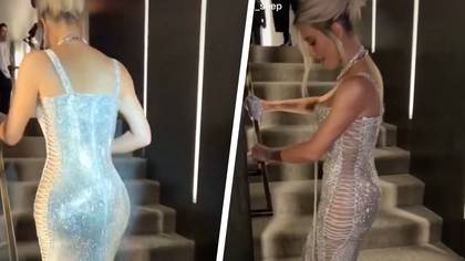 Kim Kardashian’s dress at a fashion show was so tight that she couldn’t walk up the stairs