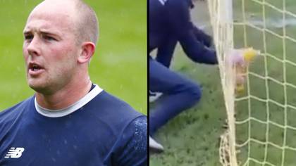 Goalkeeper sent off pitch after confronting fan who urinated in his bottle