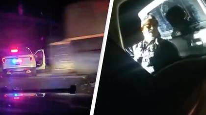 Police leave car with woman handcuffed inside just before it's hit by train
