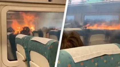 Terrifying Footage Shows Wildfires Raging Either Side of Train Tracks As Heatwave Forces Evacuations
