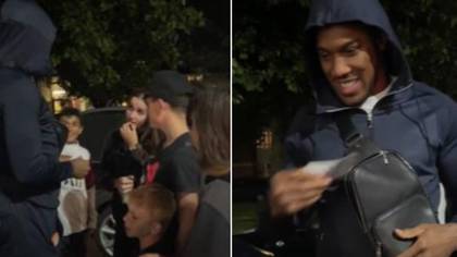 Anthony Joshua hands out wads of cash to people at his local estate