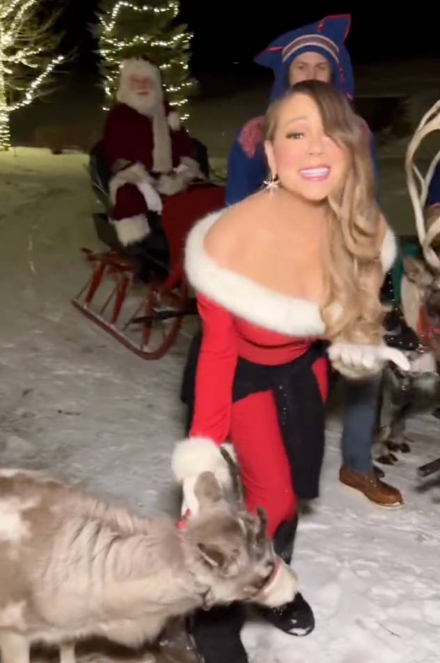 Carey and her family get to have a cuddle with Santa and his reindeers the night before Christmas. Credit: @MariahCarey/ Twitter