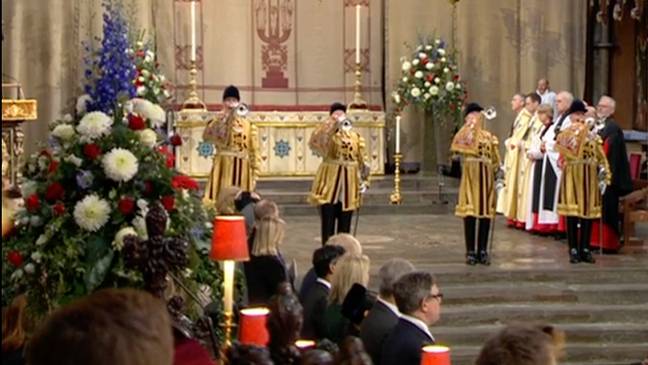 The floral arrangements at today's memorial feature orchids (Credit: BBC)