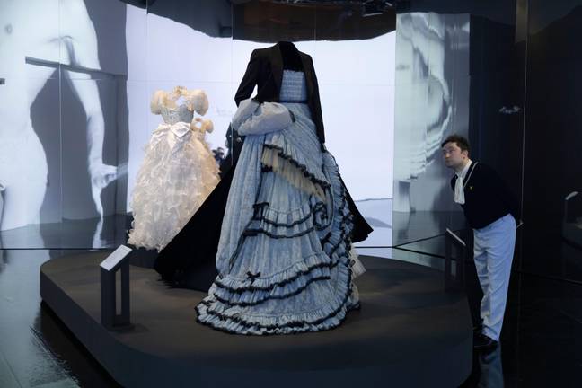 A dress on display after being worn by Harry Styles. Credit: Jeff Gilbert / Alamy Stock Photo