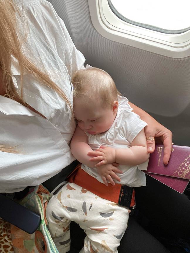 Alice is good at sleeping on planes. Credit: Caters