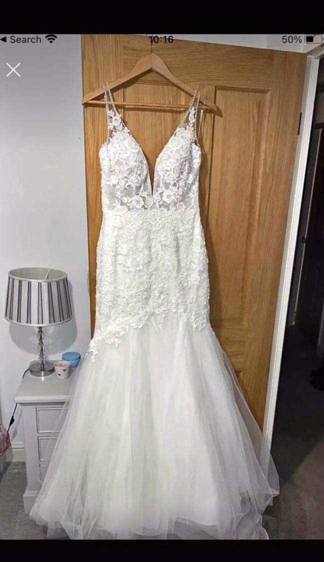 This beautiful wedding dress has been listed for just £5 with a savage description. (Credit: TikTok/pduck11)