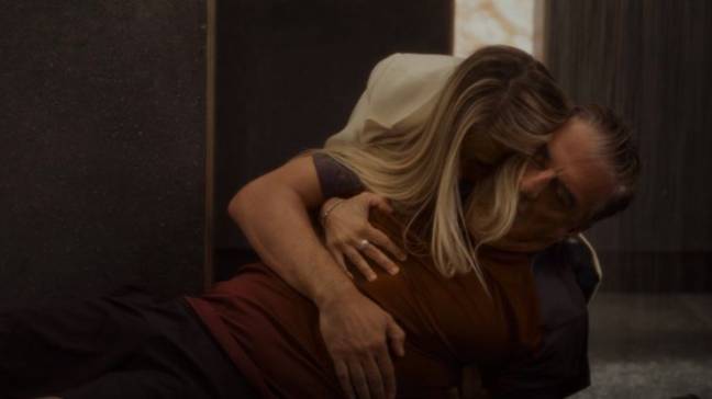 Carrie cradles her dying husband (Credit: HBO)