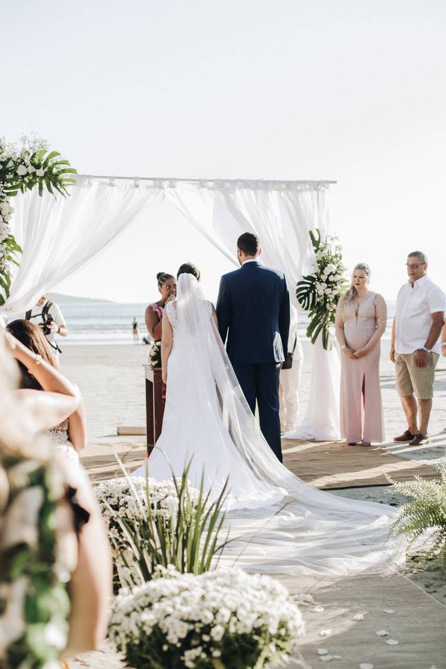 The anonymous bride has taken to Reddit to ask if she's an 'a**hole' for wanting the beach shut down. Credit: Unsplash.