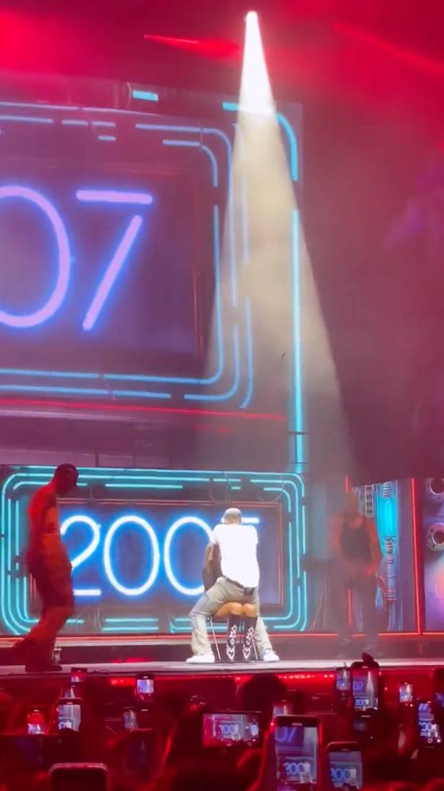 Chris Brown performs a lap dance during this part of the show. Credit: Twitter/@cblivee