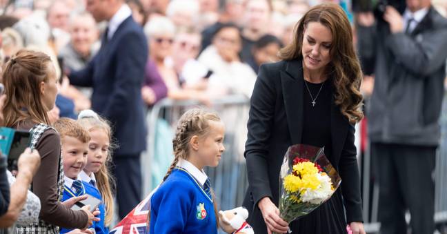 Kate picked out schoolgirl Elizabeth to add to the tributes for the Queen. Credit: Doug Peters / Alamy Stock Photo