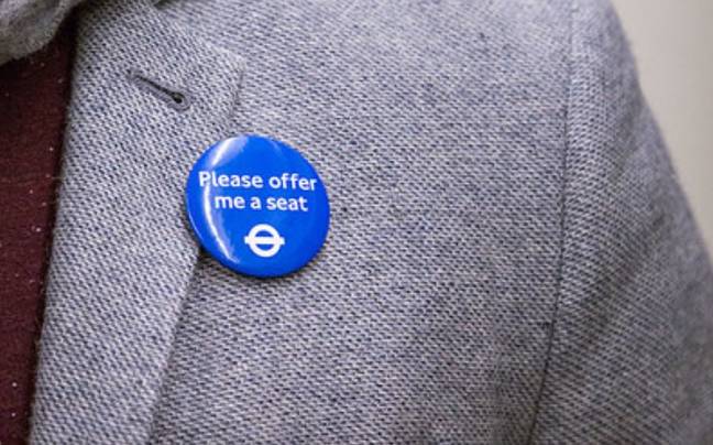 Some public transport operators offer badges for people who need seats even if it isn't immediately obvious. Credit: Transport for London