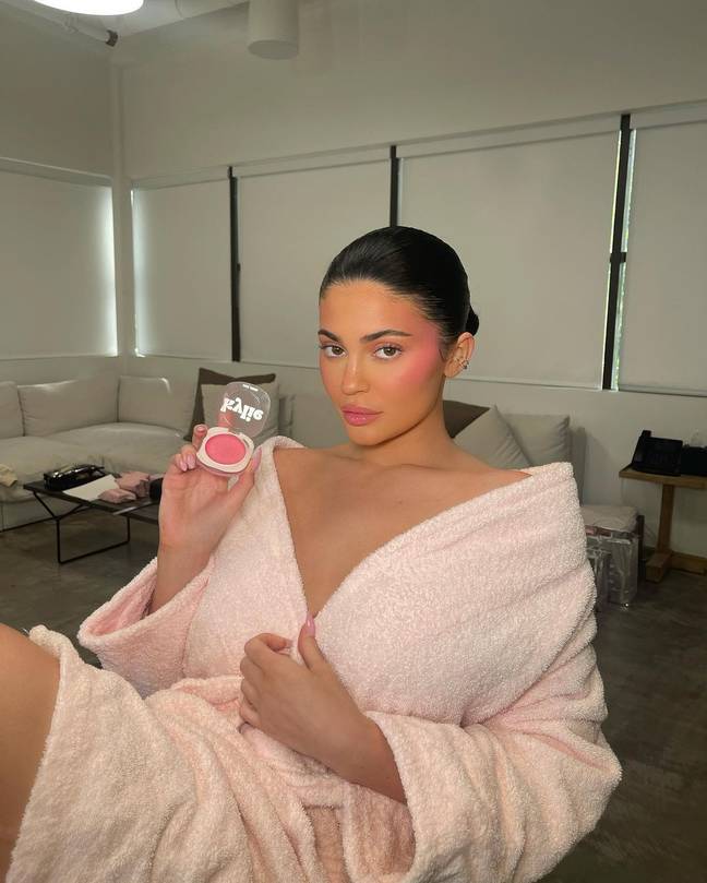 Kylie Jenner posing with a product from Kylie Cosmetics. Credit: Instagram/@KylieJenner