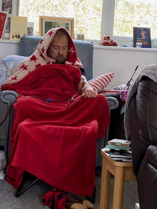 Ian is finding ways to keep warm as he can't afford to put the heating on. Credit: SWNS