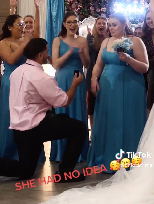 Would you let someone propose at your wedding? Credit: TikTok/@chiolafilms
