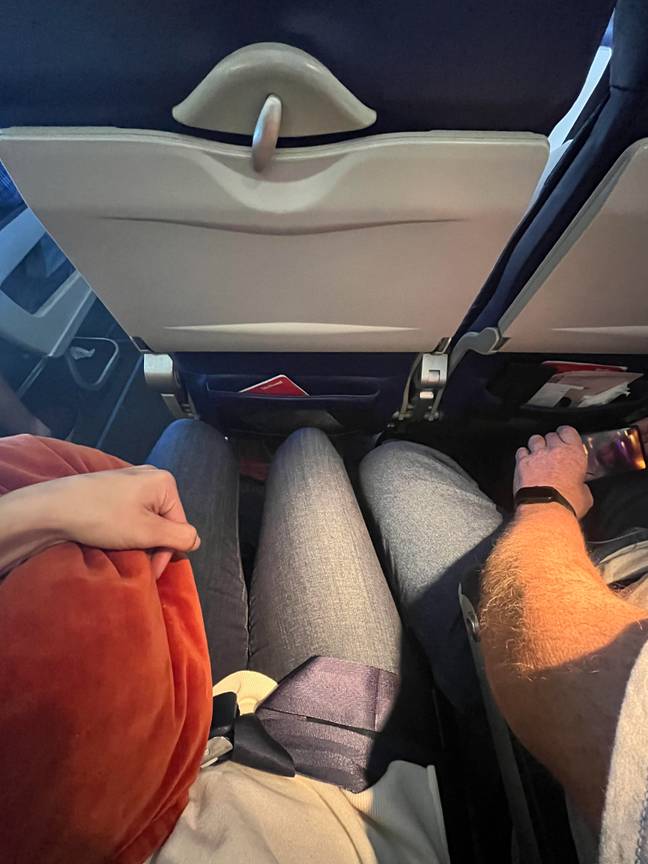 Personal space and planes aren’t particularly compatible, but this photo really takes the biscuit. Credit: Reddit/EmilyKauai