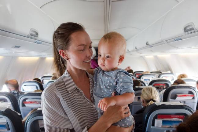 Taking your baby on a flight can be stressful. Credit: Ekaterina Demidova/Alamy Stock Photo