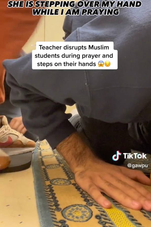 The teacher appeared to step over the students. Credit: @gawpu / TikTok