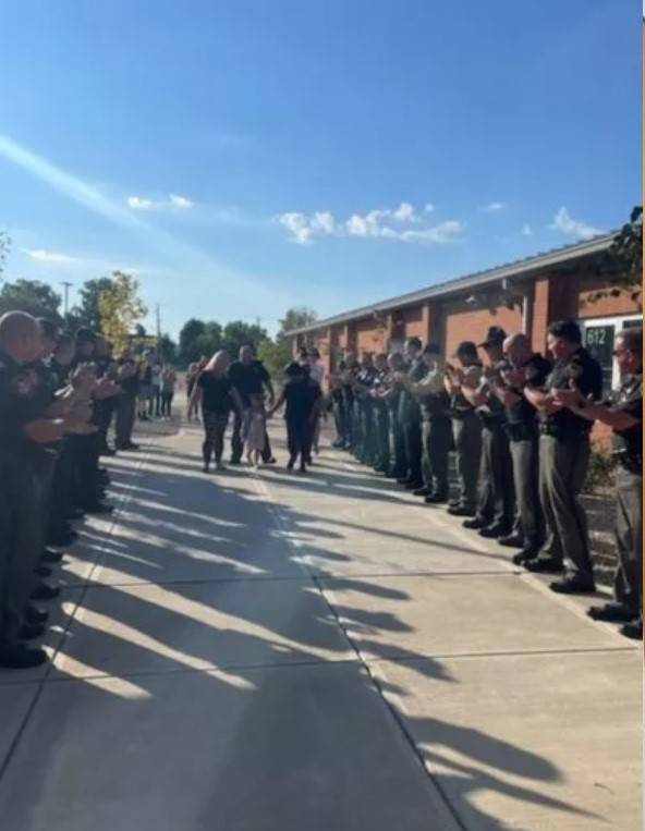 Five-year-old Lilly Disario was escorted into her first day at school by two dozen officers. Credit: Licking County Sheriff's Office